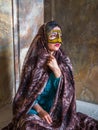 Young Muslim woman portrait, Iran. A woman from Bandar Abbas wears the traditional Arab burka